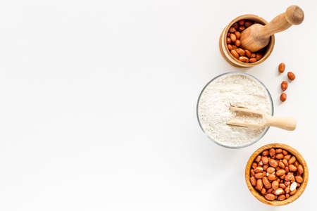 Pestle peanut flour - nuts with mortar on kitchen tableの写真素材