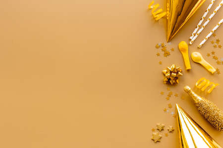 Golden party decoration flat lay. Marry Christmas and New year backgroundの写真素材
