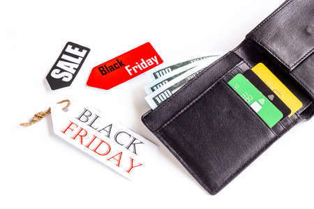 Discount shopping day - sale tag and wallet with banknotes and bank cardsの写真素材