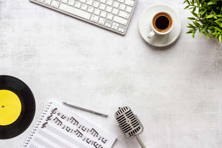 Music sheets with musical notes and microphone, top viewの写真素材