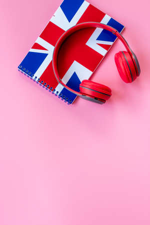 English courses concept. British flag on notebook and headphonesの写真素材