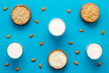 Non dairy vegan milk with almonds rice and oatsの写真素材