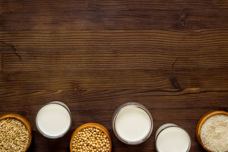 Dairy free vegan milk with nuts and cereals, top viewの写真素材
