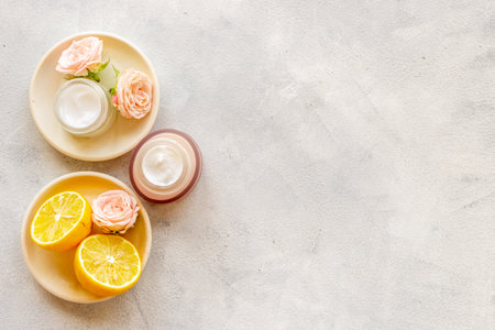Beauty cosmetic products with herbs citrus and flowersの写真素材