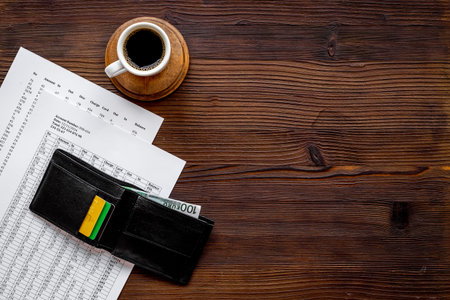 Business taxes report accounting with purse on office table, top viewの写真素材