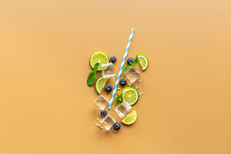 Fruit citrus cocktail or juice with ice cubes. Cocktail conceptの写真素材