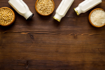 Dairy free substitute milk with nuts and cereals, top viewの写真素材