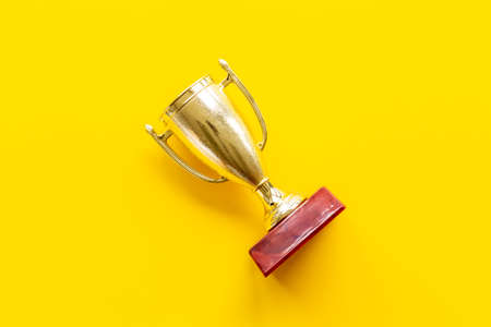 Champion award - golden trophy cup for winner, top viewの写真素材
