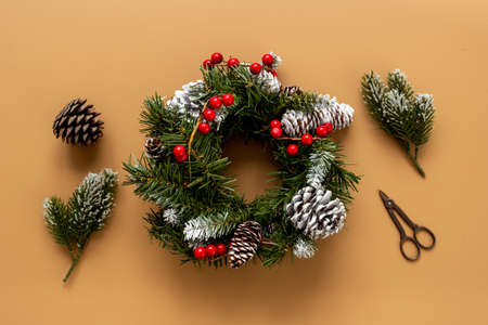 Christmas wreath with with fir tree, ribbon and decor. New year decorationの写真素材