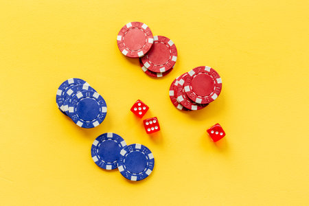 Casino gambling chips - poker background. Red and blue chipsの写真素材