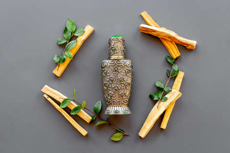 Agar wood oil fragrances or arabian oud perfume with sticks of treeの写真素材