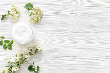 White spa medical herbal cosmetic with blossoms flowers