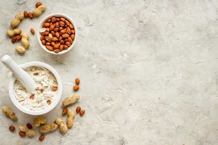 Peanut flour in bowl - gluten free nuts flour for bakingの写真素材