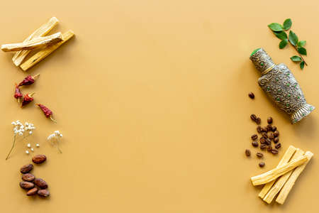 Agar wood tree oil perfume in silver bottle with spices and fruitsの写真素材