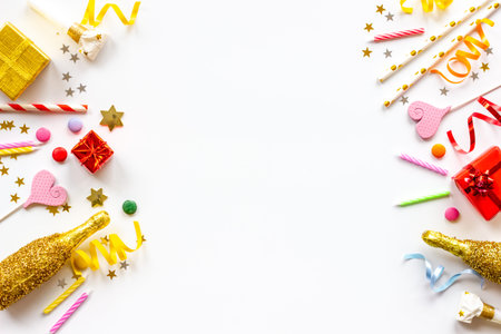 Confetti with party hats and balloons for kids birthdayの写真素材