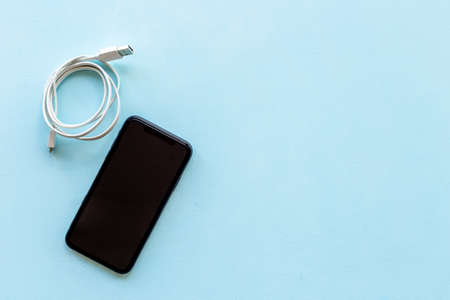 Usb cable for charging smartphone or laptop, top viewの写真素材