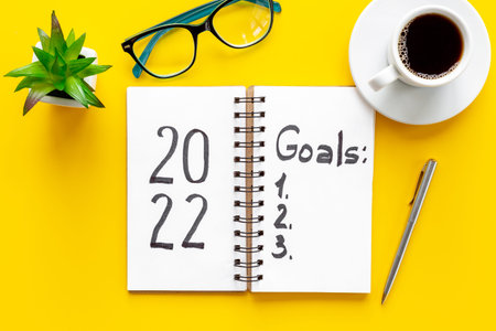 New year beginning solution goals concept - hand writing text, top view