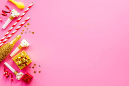 Children kids party flat lay confetti with party hats and balloonsの写真素材