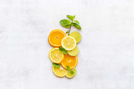 Cocktail concept. Glass of juice made of citrus with cocktail tubeの写真素材