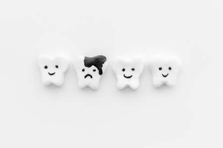 Oral health and care. Teeth with caries or plaque modelsの写真素材