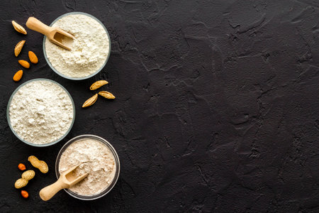 Various types of gluten free flour - almond peanut oat rice flour in bowls