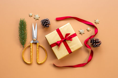 Christmas gifts background - golden gift boxes with red ribbon