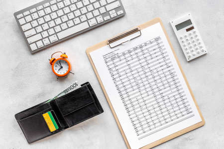 Business taxes report accounting with purse on office table, top viewの写真素材
