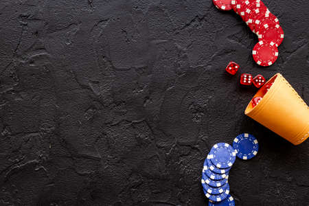 Red dices and gambling chips for poker. Casino games background