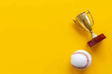 Golden trophy cup with sport game ball. Championship winner conceptの写真素材