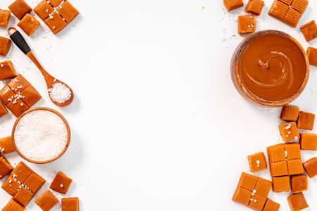 Homemade caramel candies with caramel sauce and saltの写真素材