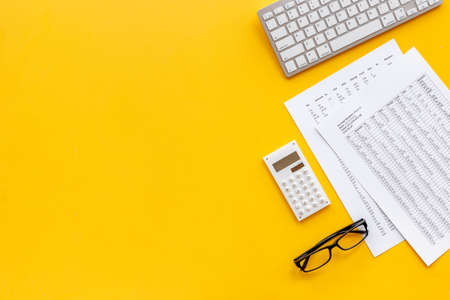 Taxes reports or bill calculating with calculator. Financial business conceptの写真素材