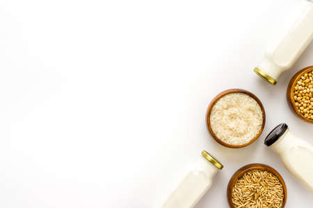 Dairy free vegan milk with nuts and cereals, top viewの写真素材