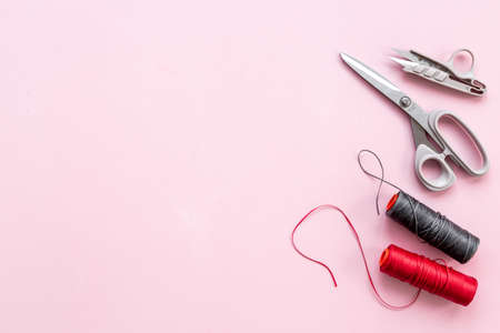 Fashion designer or seamstress table with tailor toolsの写真素材