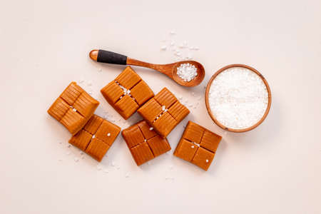 Caramel pieces of caramel candies with sea salt, top viewの写真素材