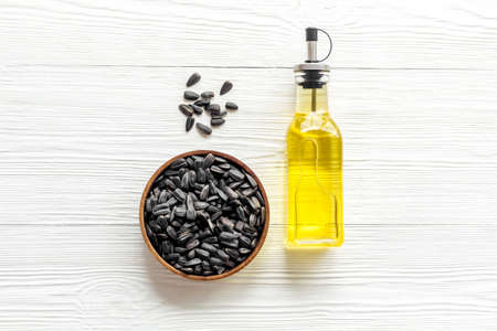 Sunflower oil in bottle with seeds. Cooking oil backgroundの写真素材