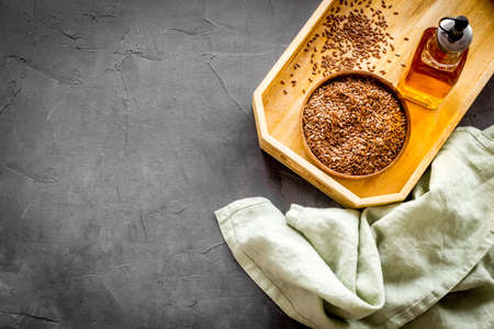 Sesame oil in bottle with ingredient - sesame seedsの写真素材