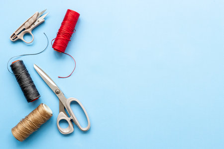 Fashion designer or seamstress table with tailor toolsの写真素材