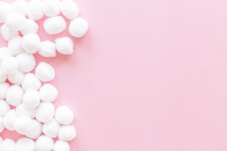 Cosmetic makeup remover supplies - cotton balls , top viewの写真素材
