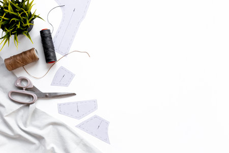 Sewing patterns with fabric - fashion designer table with tailor tools