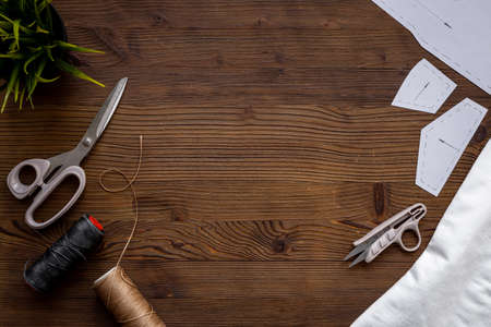 Sewing background. Tailor tools dress patterns in workshopの写真素材