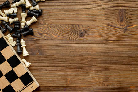 Chess pieces battle on chessboard. Teamwork concept