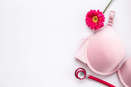 Breast cancer concept with pink bra. Women health backgroundの写真素材