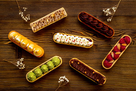 Sweet food pattern of eclairs with color topping. Sweet shacks