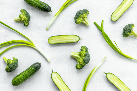 Pattern of green vegetables with broccoli and cucumber. Food background