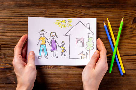 Mortgage concept. Happy family in house - Childrens drawingの写真素材