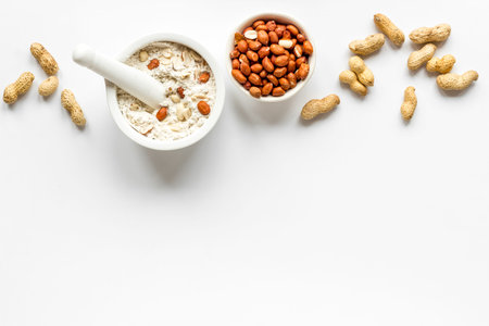 Peanut flour in bowl - gluten free nuts flour for baking