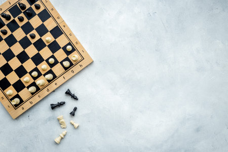 Winner of game concept. Chess pieces battle on chessboardの写真素材