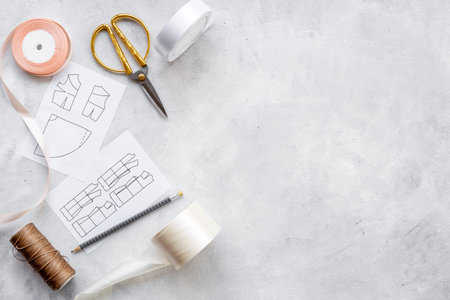 Sewing background. Tailor tools dress patterns in workshop