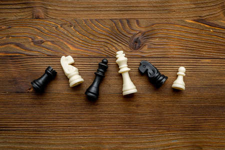 Flatly of chess pieces, top view. Chess game as victory conceptの写真素材