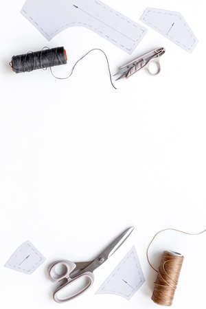 Sewing background. Tailor tools dress patterns in workshopの写真素材